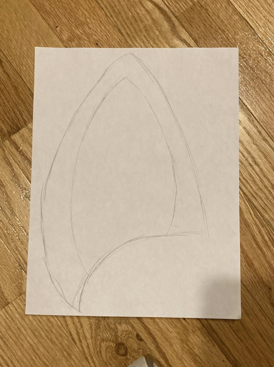 Ohrenmuster auf einem Blatt Papier gezeichnet