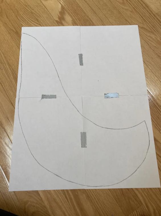 Maßstabsgetreue Zeichnung eines Schwanzes auf Papier
